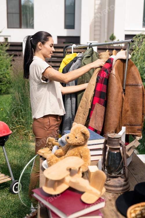 Preview: Choosing outer clothing at yard sale