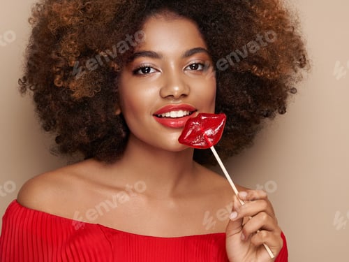 Preview: Woman Posing with Red Lips Lollipop