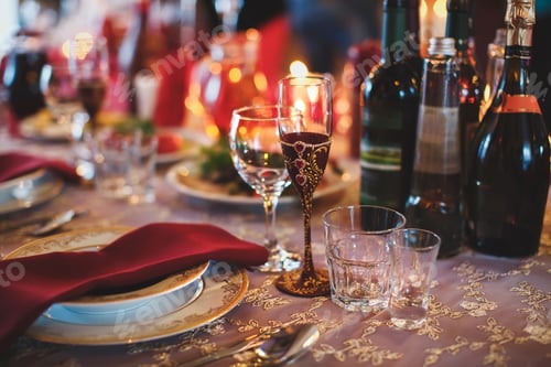 Preview: Cutlery and glasses. Dinner in the restaurant. Candles on the table. Banquet hall. The wedding feast