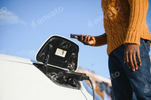 Preview: Man turning on charging of car