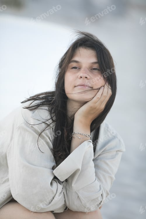 Preview: Portrait of a very happy young woman loving the life shes living having fun on the beach