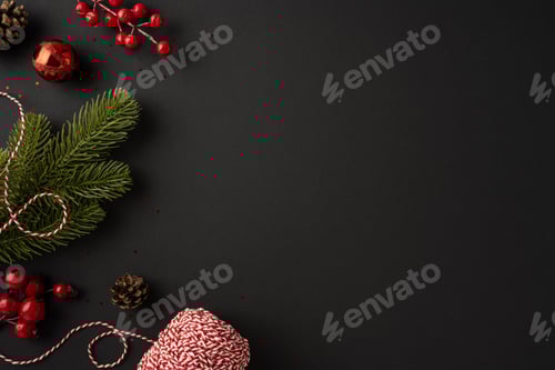 Preview: Festive Christmas arrangement featuring red bauble, pine branches, pinecones