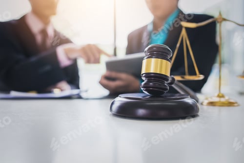 Preview: Business lawyer working about legal legislation in courtroom to help their customer.