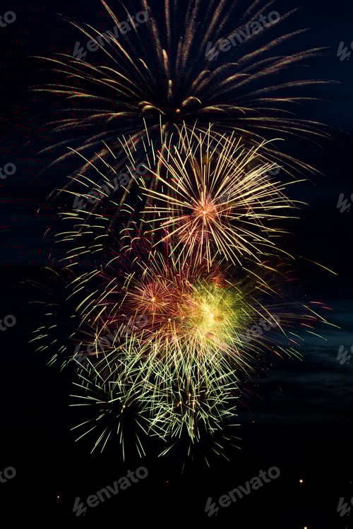 Preview: Bright colored fireworks on black background.
