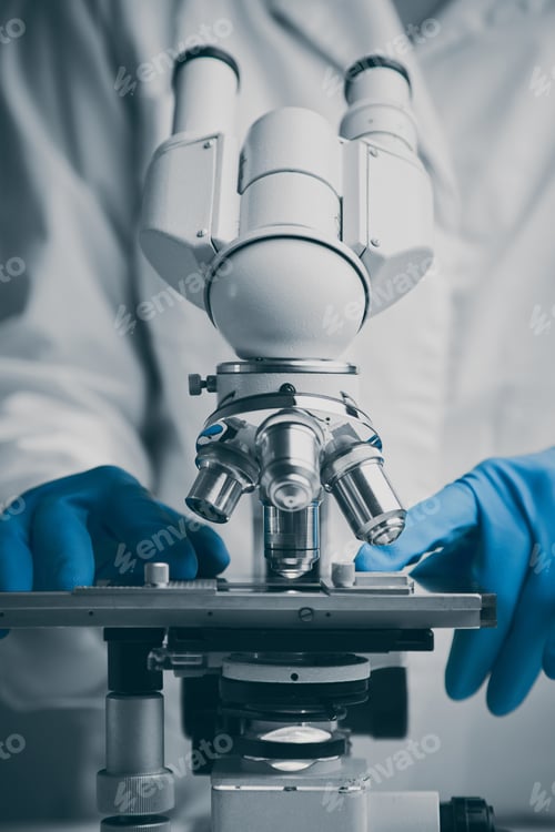 Preview: Close up of examining of test sample under the microscope