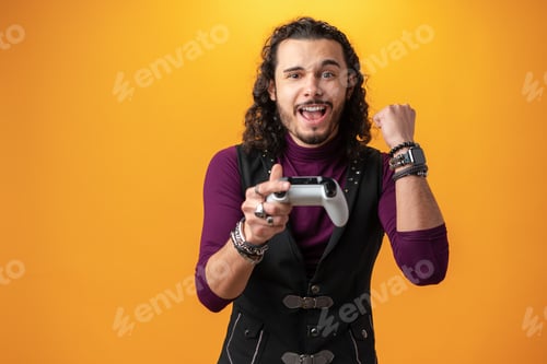 Preview: Excited Young Man Playing Video Game