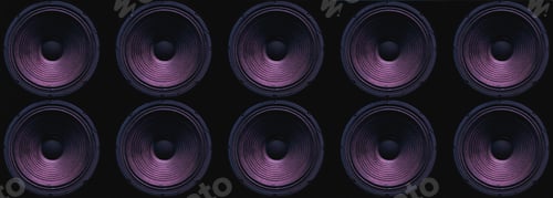 Preview: Close-up of speakers membrane on black background with colored lighting.