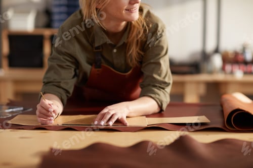 Preview: Unrecognizable Woman in Leather Shop