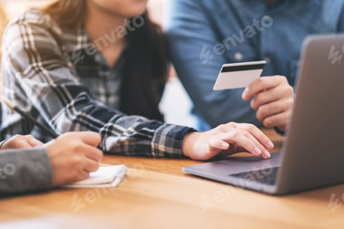 Preview: Businessman using credit card for purchasing and shopping online