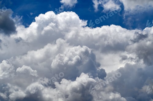 Preview: Blue sky with fluffy clouds