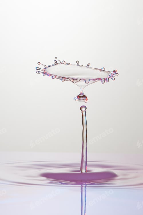 Preview: Splash of colorful liquid with high speed flash