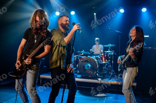 Preview: Rock band performing live on stage with energetic musicians