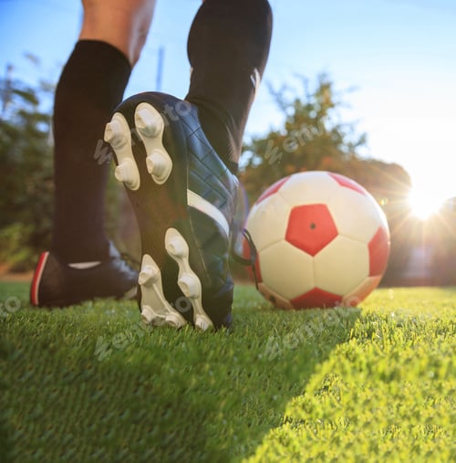 Preview: Female soccer football. Woman athlete ready to kick the ball