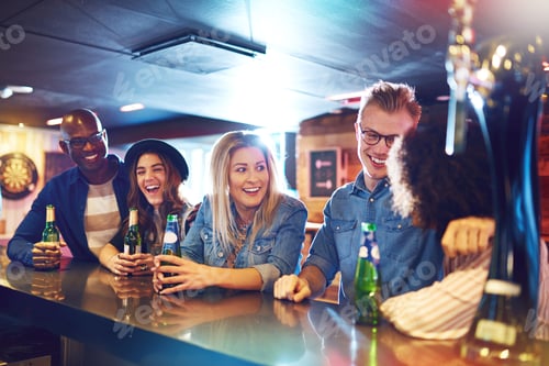 Preview: Group of happy people at bar counter