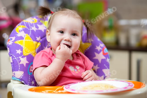 Preview: Pretty Kid Girl Eating Spaghetti At Home