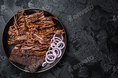 Preview: BBQ pulled pork meat on plate. Black background. Top view. Copy space