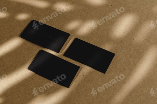 Preview: Black business cards on cork board table