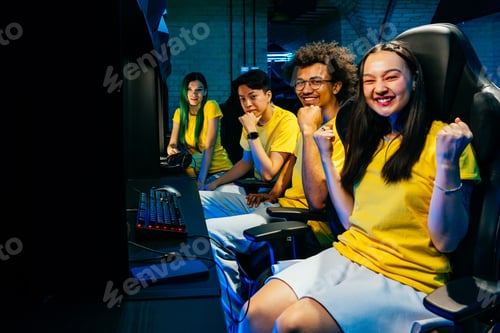 Preview: Multiethnic group of young friends playing videogames