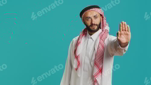 Preview: Model doing stop symbol with palm