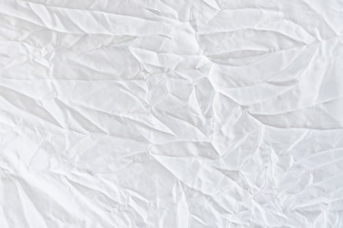 Preview: Abstract background from corrugated white fabric texture.