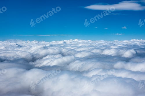 Preview: White clouds in a blue sky.