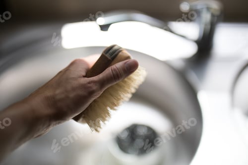 Preview: Kitchen sink lit by natural light from nearby window