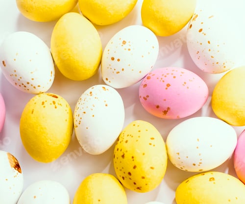 Preview: Colorful chocolate Easter eggs background with copy space