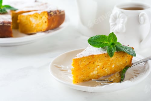 Preview: Slice cheese casserole with pumpkin and cinnamon for breakfast on ceramic plate on a light backgroun