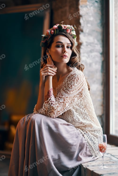 Preview: Serene Woman with Floral Crown Posing Indoors