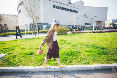 Preview: young beautiful blonde hipster woman