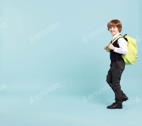 Preview: Boy in School Uniform and Backpack Walking