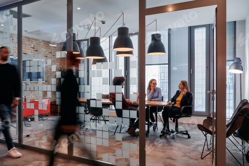 Preview: In the dynamic hustle and bustle of a business environment, a group of young business professionals