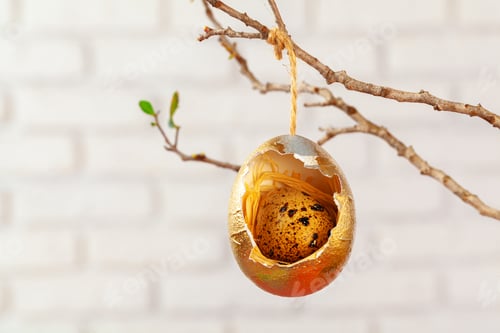Preview: Easter decor, eggshells painted golden with quail egg inside