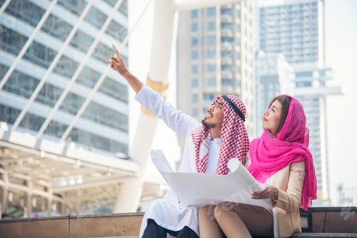 Preview: Arab team hold digital tablet uae union teamwork people. Digital marketing arab group