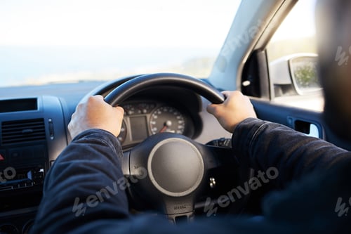 Preview: You know more of a road by having traveled. Shot of a unrecognizable man driving his car.