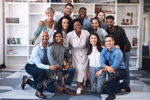 Preview: Portrait of a diverse group of businesspeople standing together in an office