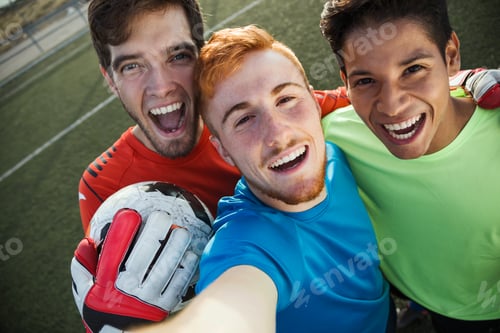 Preview: Three friends on soccer field