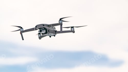 Preview: Drone quadcopter with digital camera in flight on sky