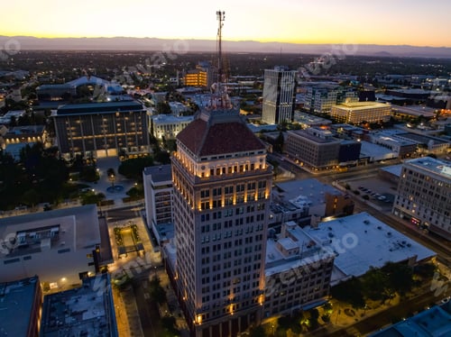 Preview: Aerial view of Fresno city illuminated at sunset