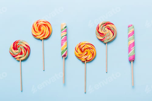 Preview: Set of colorful lollipops on colored background. Summer concept.