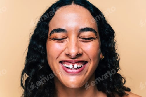 Preview: Beauty studio portrait of beautiful hispanic woman with diastema