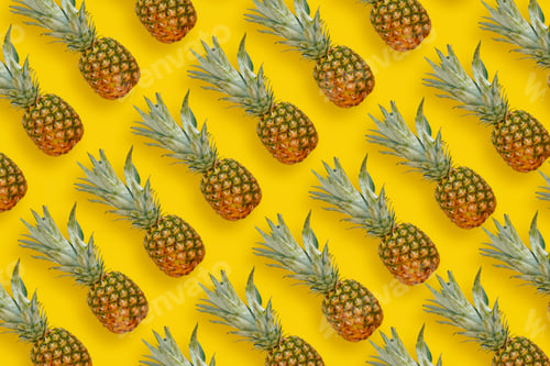 Preview: Many pineapples on bright yellow paper background