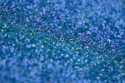 Preview: Blue decorative sequins. Background image with shiny bokeh lights from small elements
