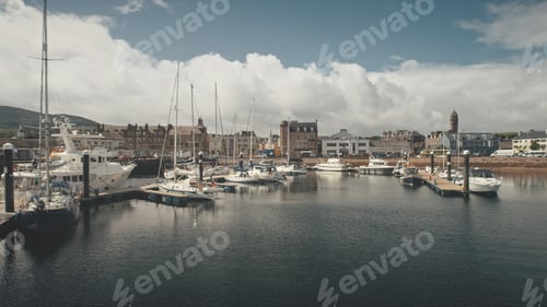 Preview: Ships, yachts at ocean bay aerial. Cityscape with old historic architecture landmark at port city