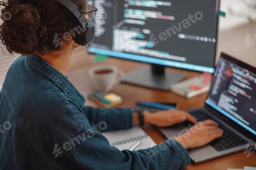 Preview: Female freelancer making new project as web designer and programmer on her computer at home