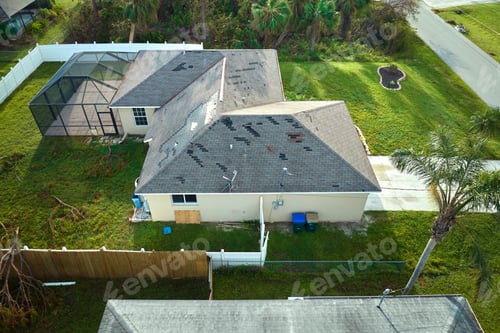 Preview: Hurricane Ian destroyed house roof in Florida residential area.