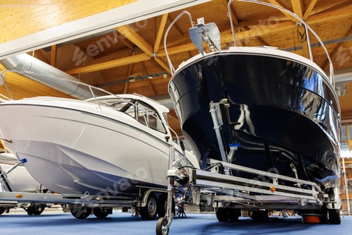 Preview: Many small big ship yachts at boat show exhibition indoors hall. Marine fishing yachting sailing