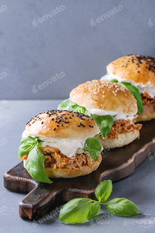 Preview: Pulled Chicken Sliders with Basil on Wooden Board