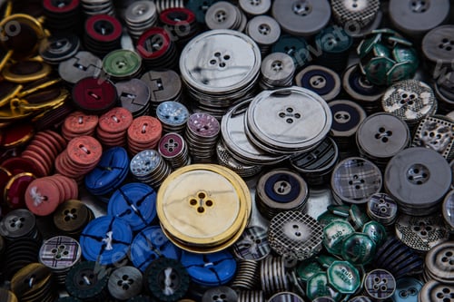 Preview: Closeup shot of various colorful sewing buttons - perfect for a fashion concept