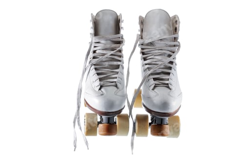 Pair of White Roller Skates with Tan Wheels